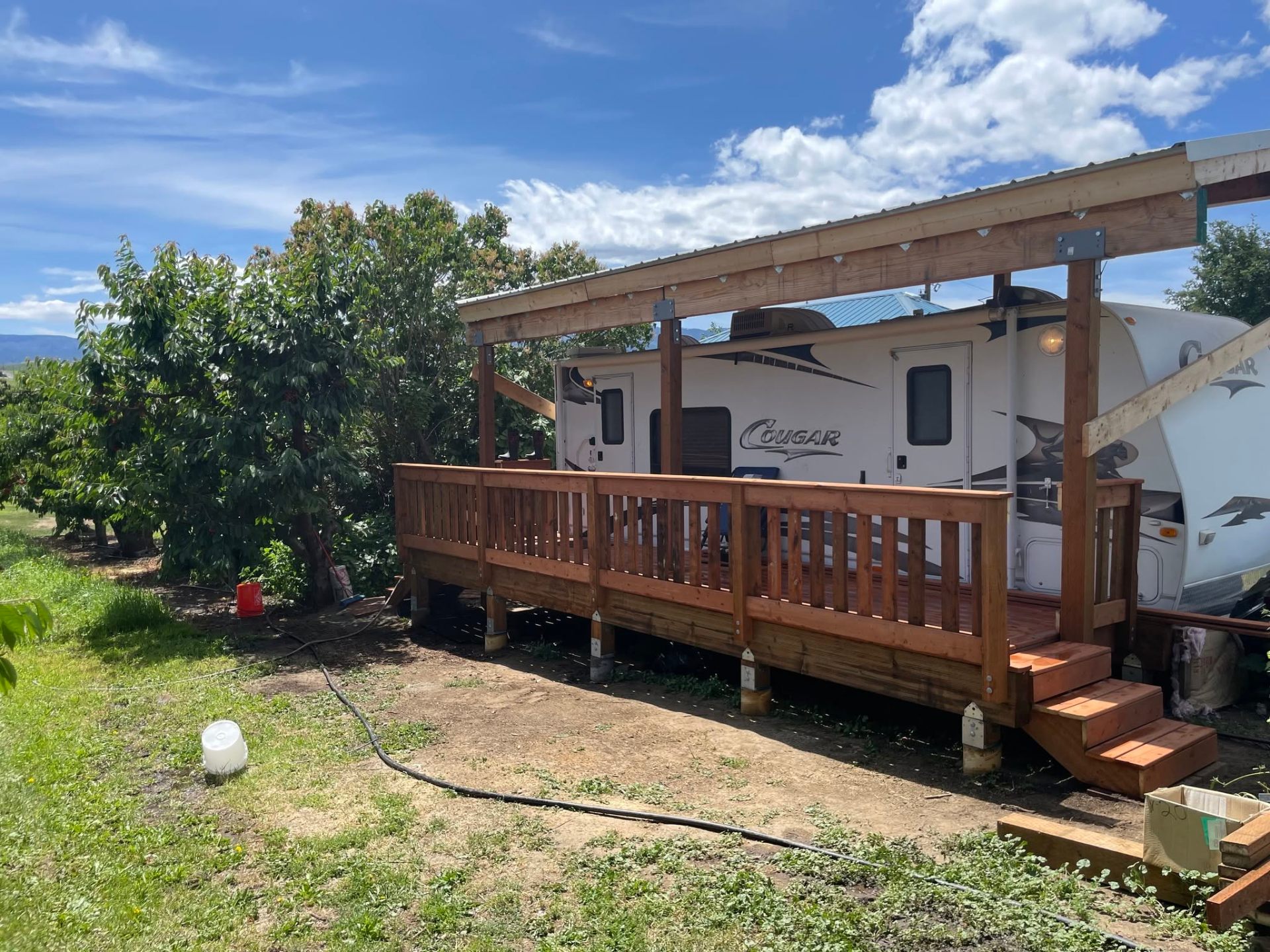RV cover with attached cedar deck and ramp in the Wenatchee Valley